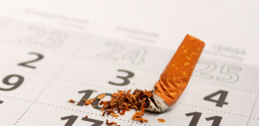 Mégot de cigarette sur un agenda