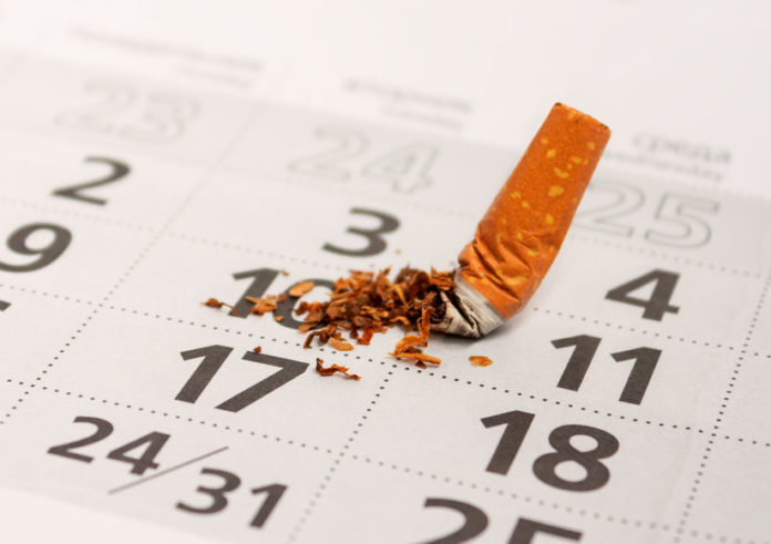 Mégot de cigarette sur un agenda